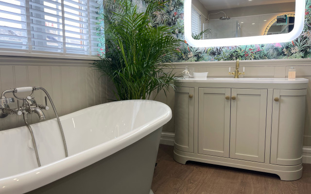 Free-standing bath in a serene bathroom setting